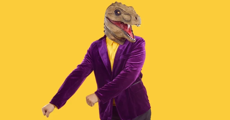 Man in purple suit with a funny dinosaur mask on his head - This brain break dance song helps preschoolers develop memory, sequencing, gross motor skills, and early literacy through movements.