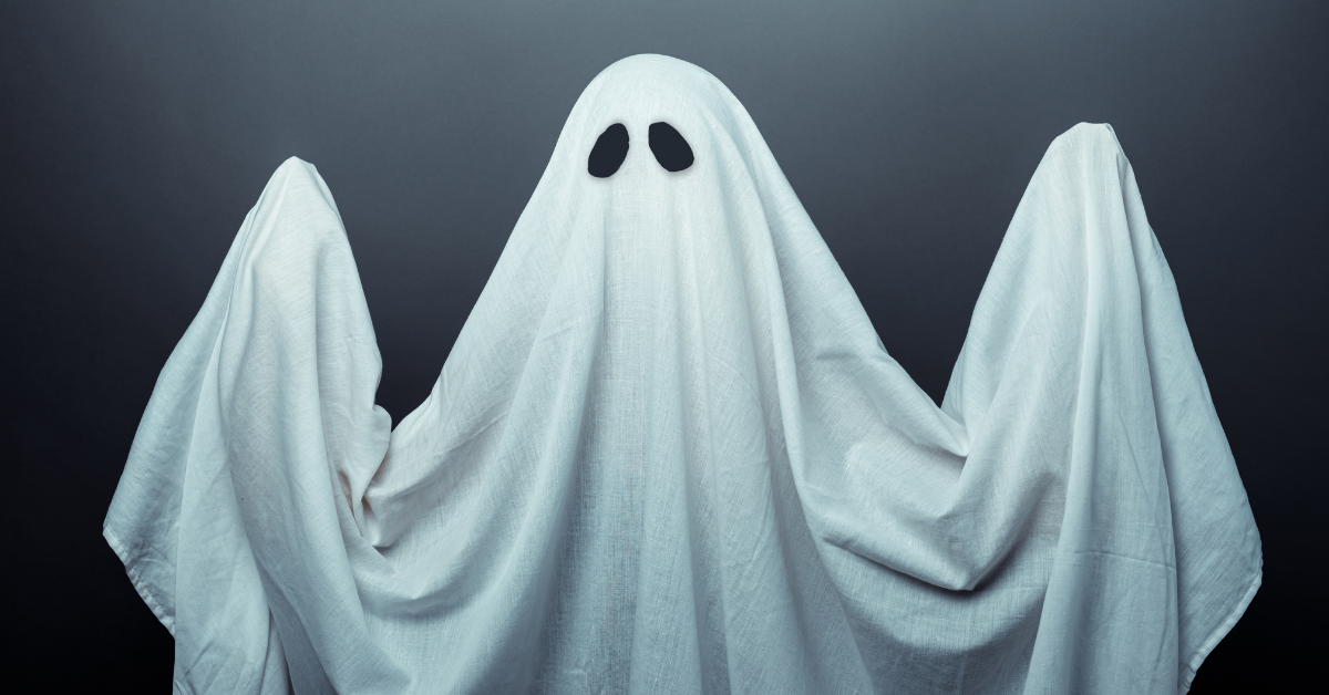 Kid dressed as a ghost